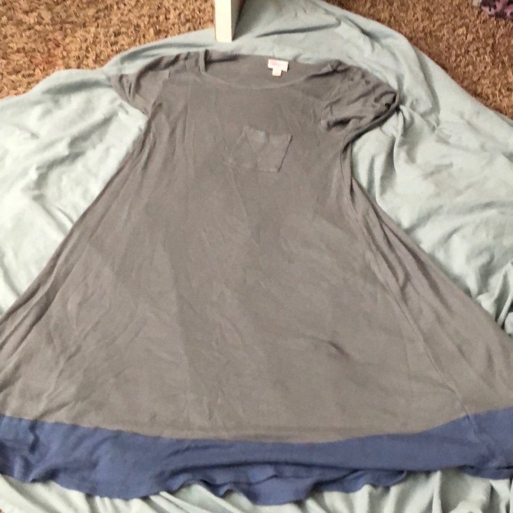 Never worn. Dark lavender and blue dress.